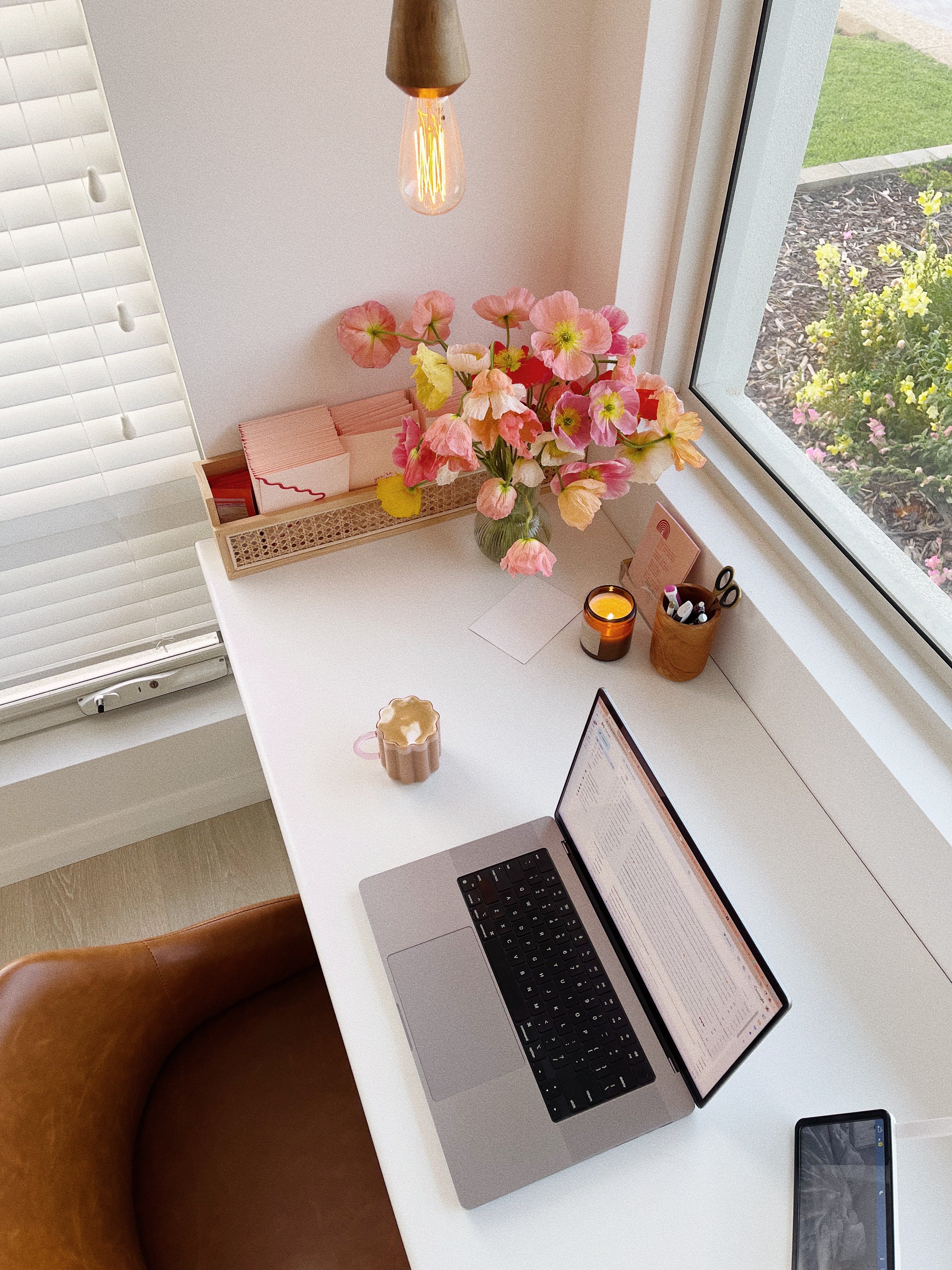 pink computer on desk